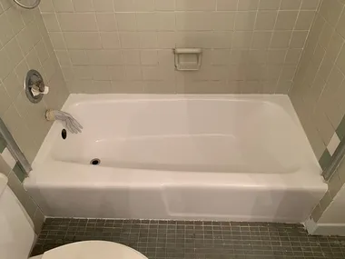 Pristine white bathtub after professional refinishing work in Los Angeles