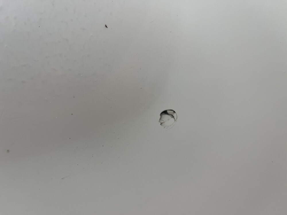 Hole in bathtub surface
