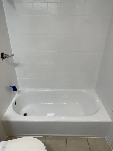 Modernized bathroom walls after professional tile reglazing
